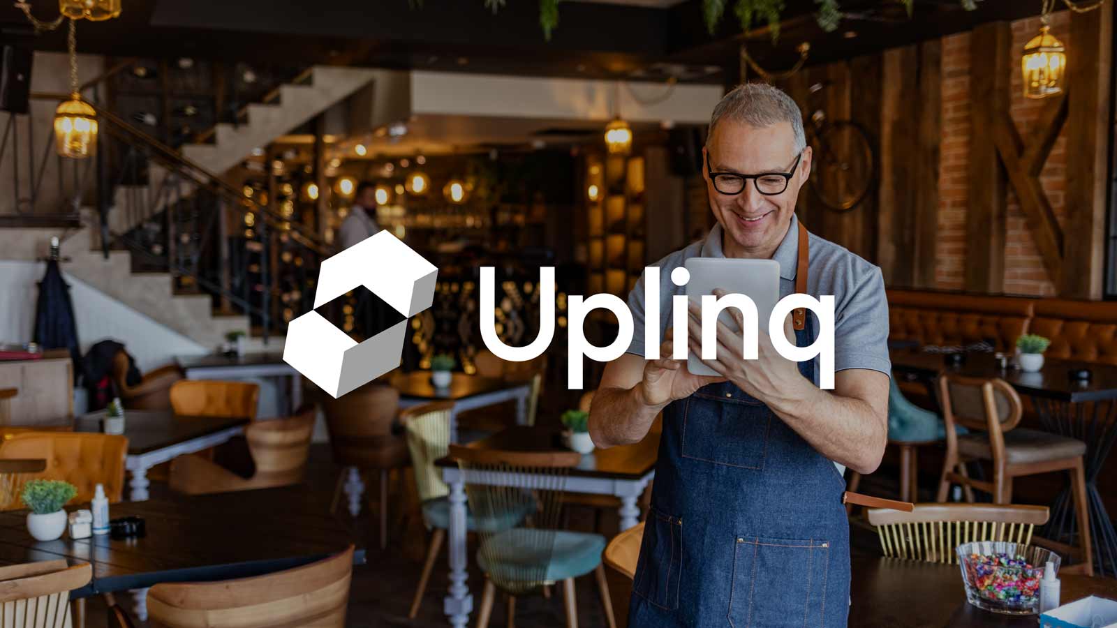 Uplinq logo superimposed on restaurant scene.