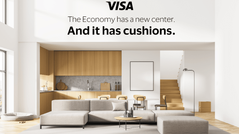 Living room with large couch with text
