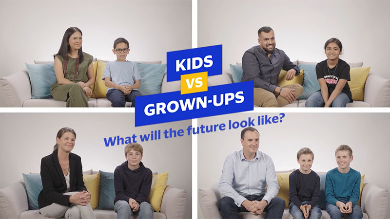 Children and adults engage in a lively discussion about their visions of the future